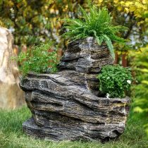 Декоративный камень-кашпо для сада